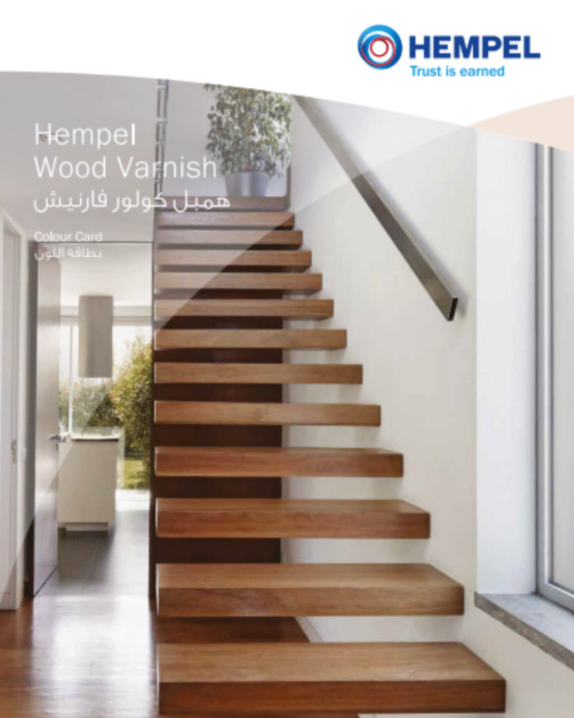 Hempel Wood Varnish Colour Card cover featuring a modern interior with a floating wooden staircase.