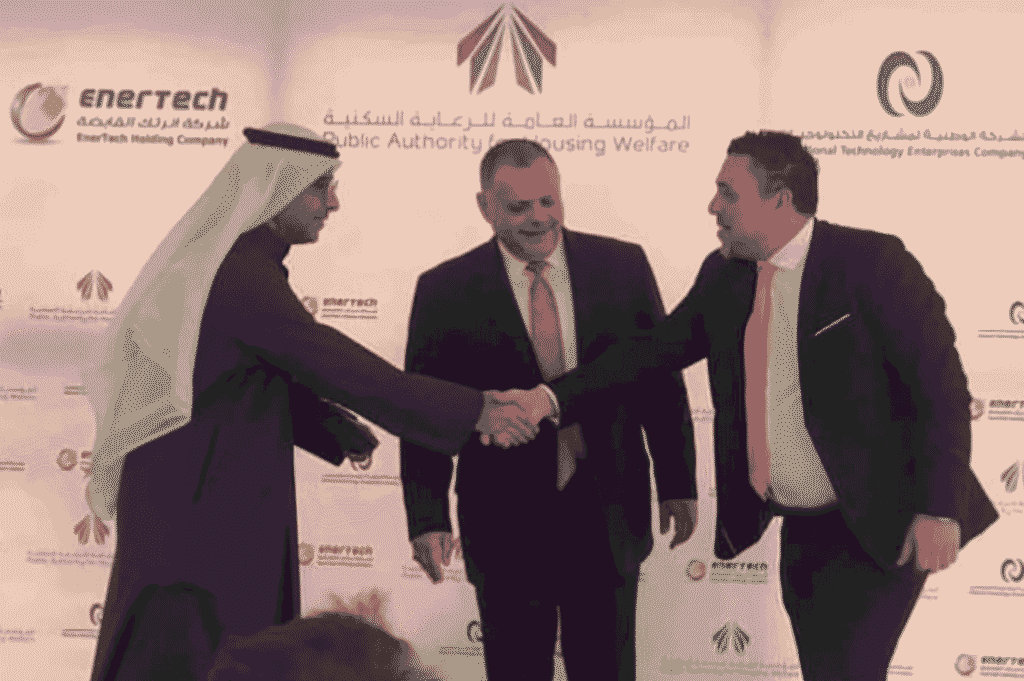 Bilal and business executives shaking hands
